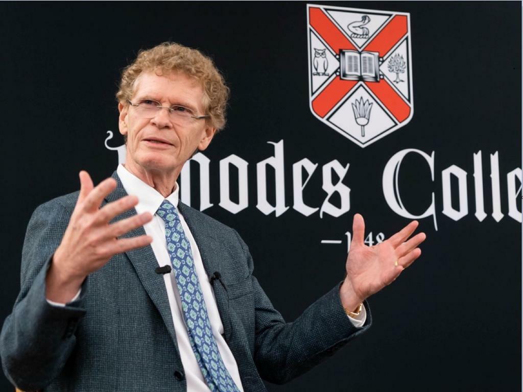 image of Cary Fowler making a presentation in front Rhodes College signage