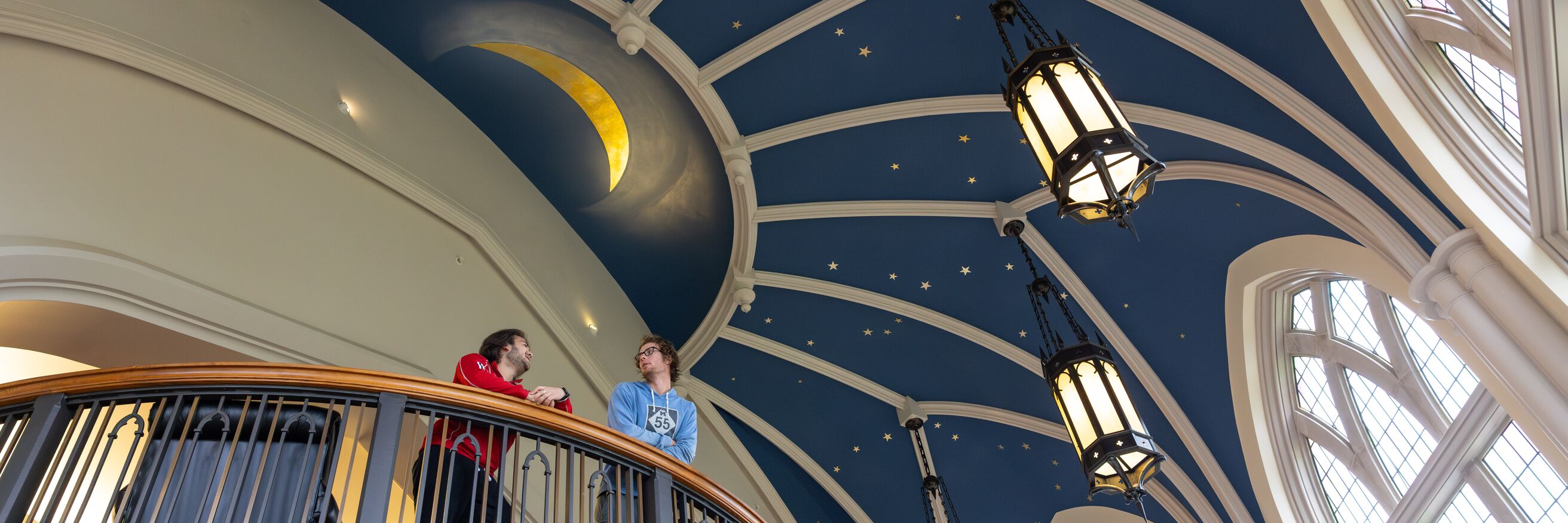 Students Looking over balcony