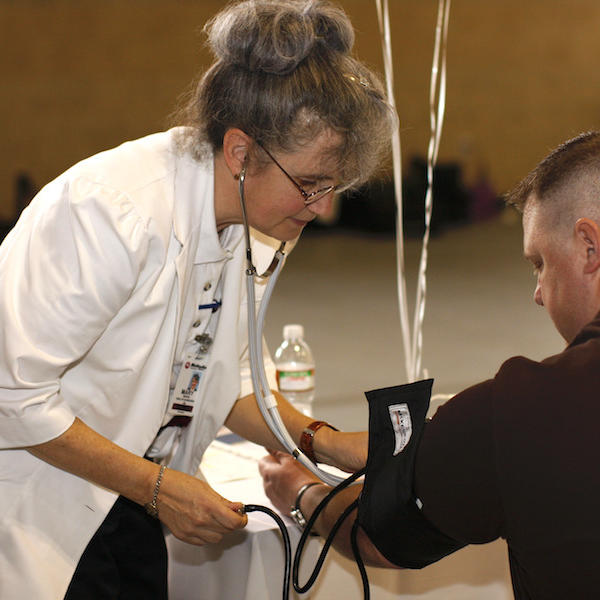 A student getting their blood pressure measured