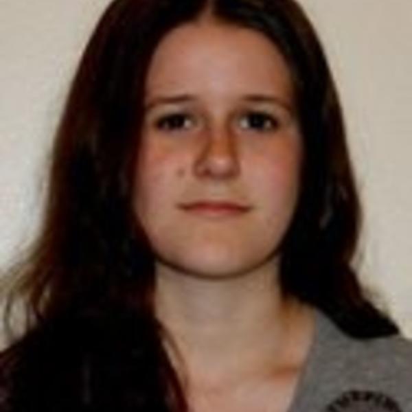 a female student with long dark hair