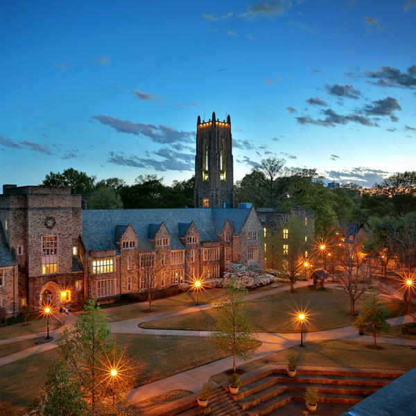 Southwestern Hall and Halliburton set against the early evening sky.