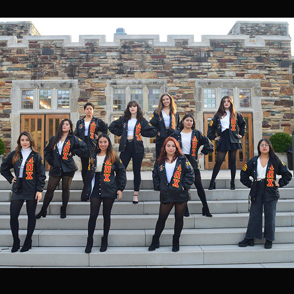 a group of young women on steps