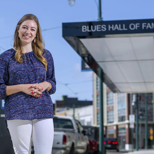 a female student in front of the Blues Hall of Fame