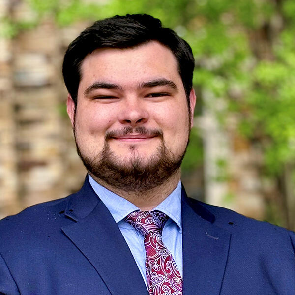 Brock Netherland, a young man with dark hair and a beard