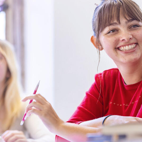 two students in a classroom