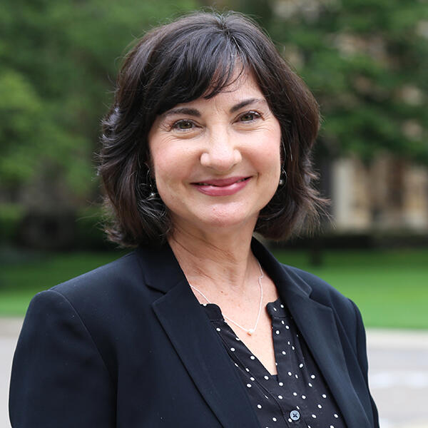 a woman with short dark hair