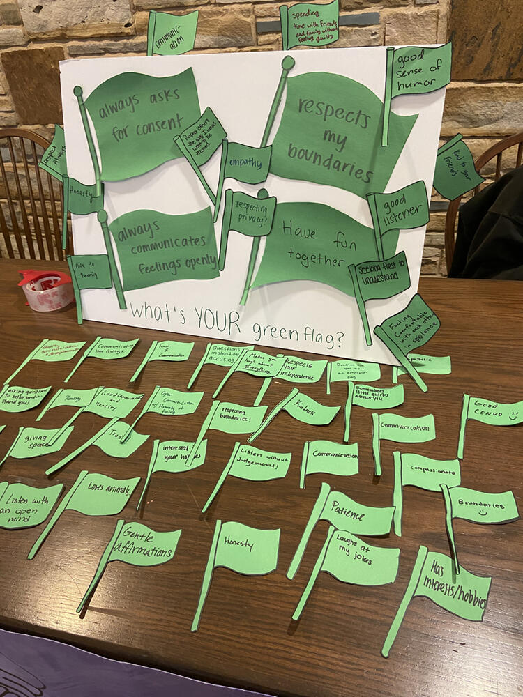 a table with green flags 