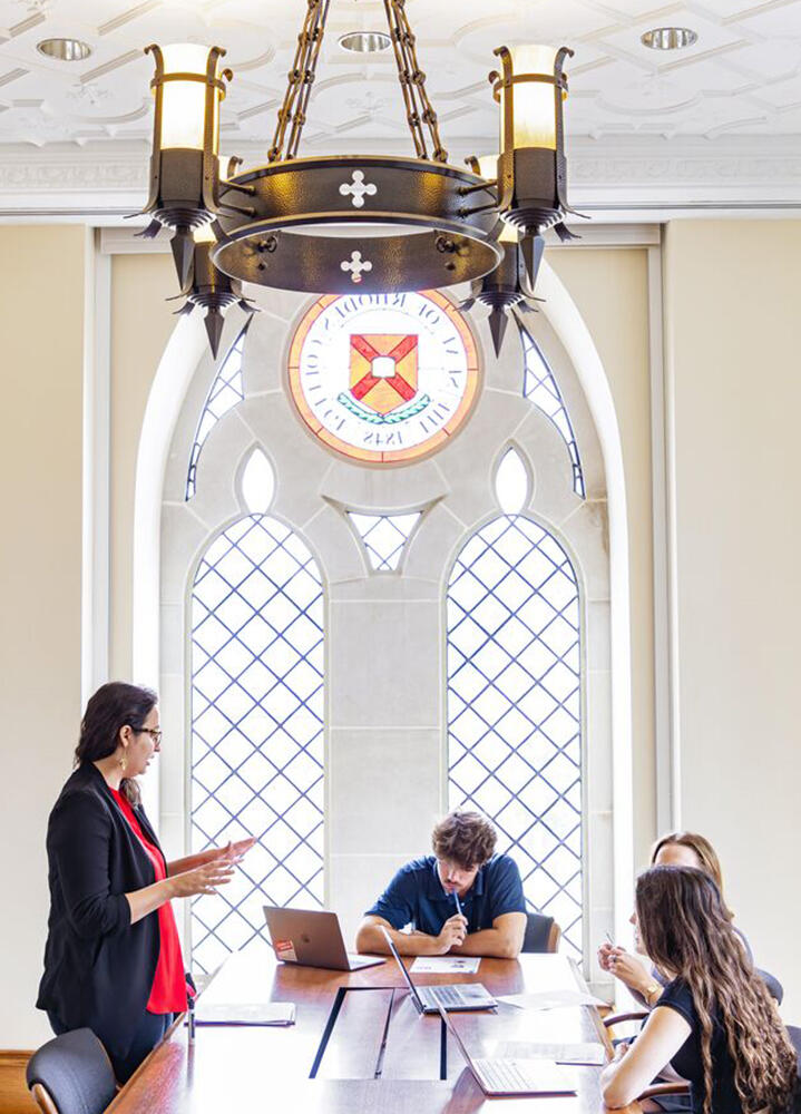 students and a professor in a classroom