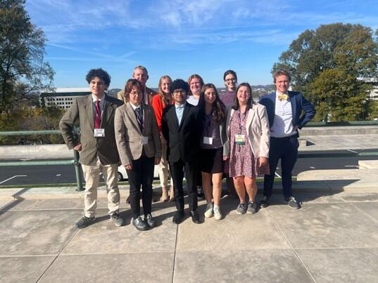 a group of students with badges